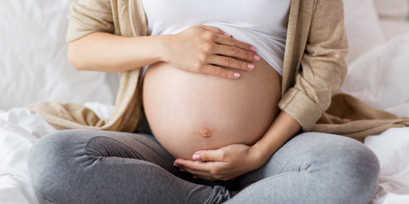 baby boy carrying belly