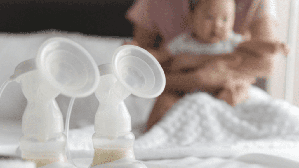 Breast-pumps-in-foreground-with-mom-and-baby-in-background